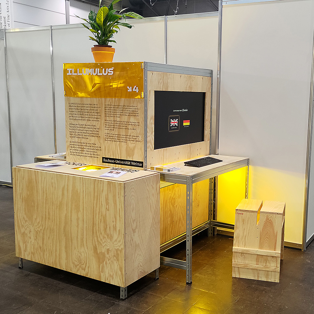 The Illumulus wooden booth at the Leipzig Book Fair 2024: a plywood cube with a golden ILLUMULUS sign, a screen, a keyboard, and warm yellow light
